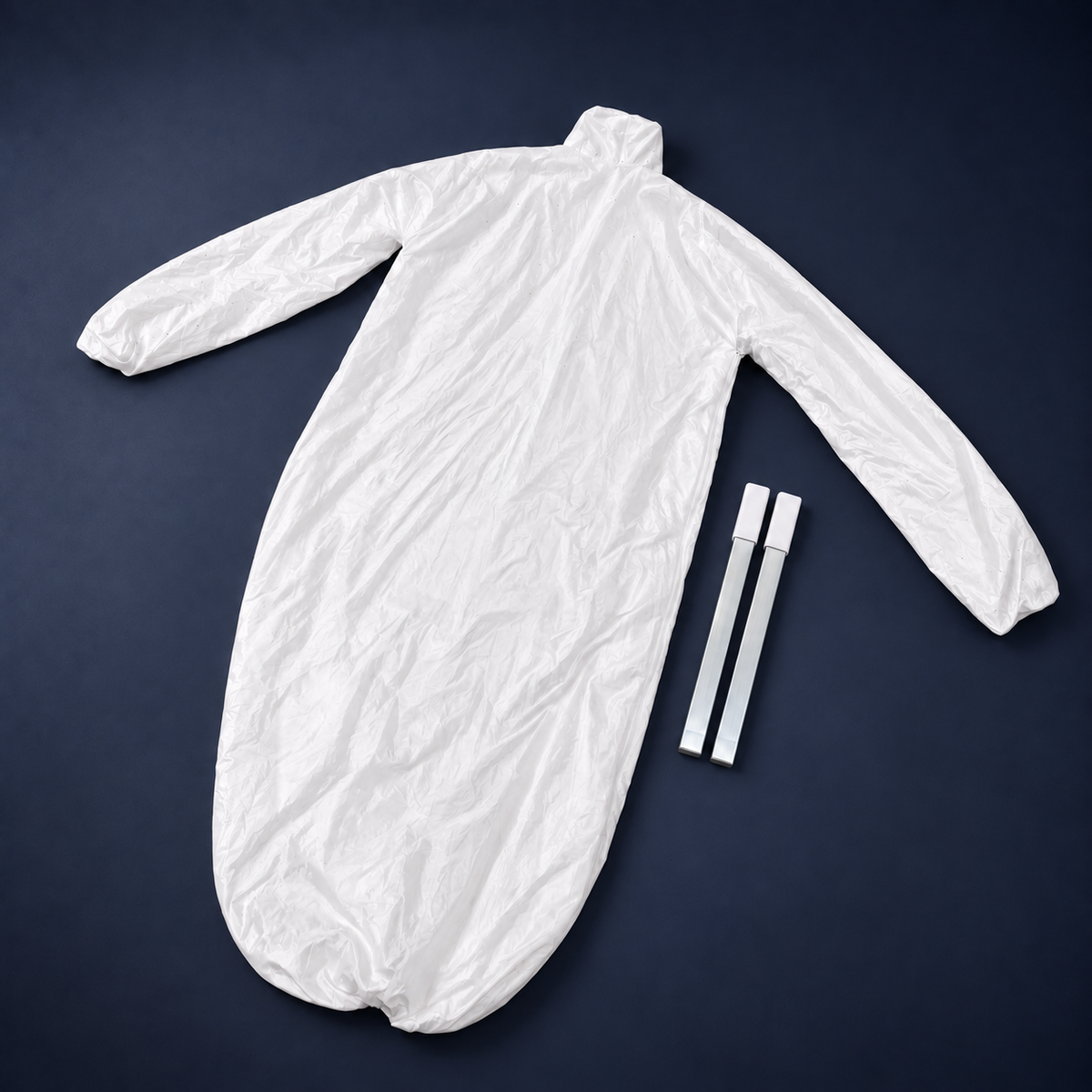 Lissaire Dress Attachment laid flat, a long white dress balloon with two extension rods, on a navy background