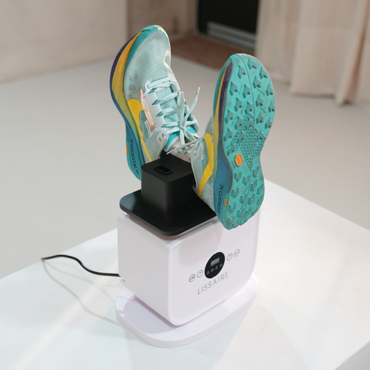 Shoes being dried on Lissaire’s included rack attachment