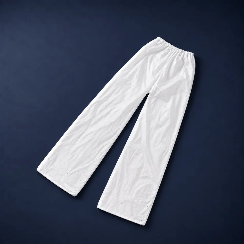 Lissaire pants attachment, a white inflatable trouser cover laid flat on a navy background